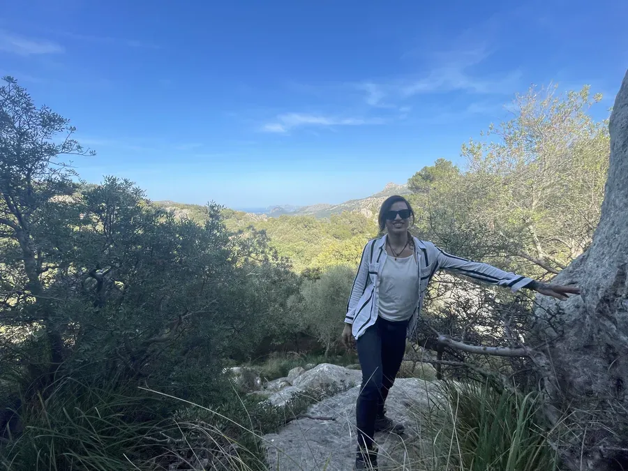 Kim, founder of Altered Balance, out on a sunlit hillside