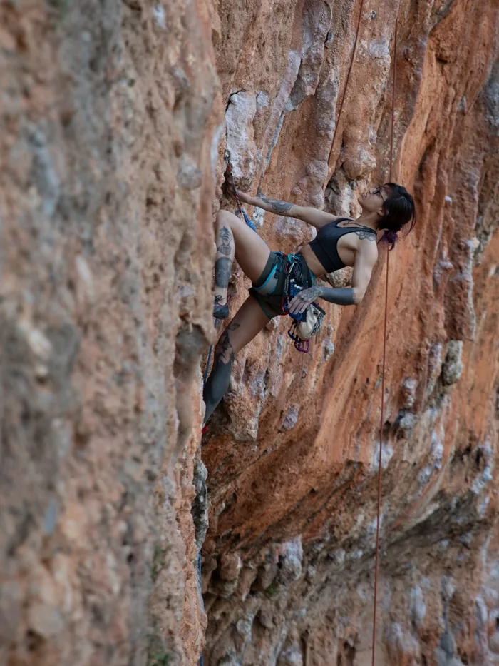 Climbing a steep limestone route