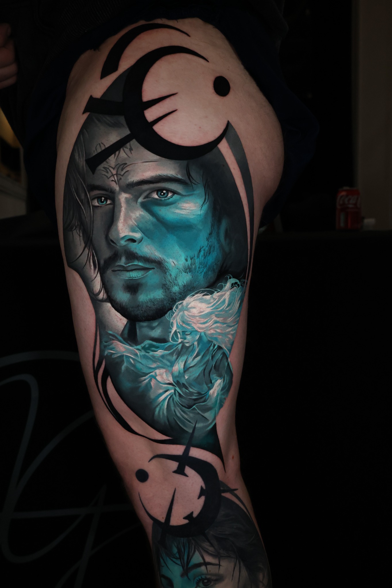 Colour realism portrait tattoo with geometric elements